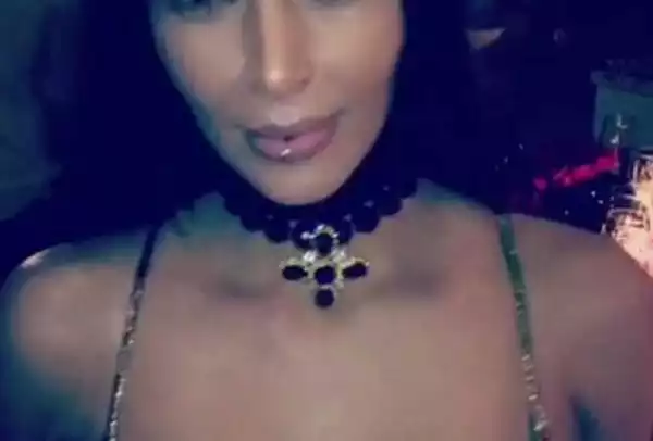 Kim Kardashian Shows Off Her Lip Ring At Kris Jenner’s Christmas Bash